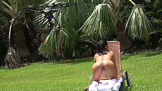 Big Ass Flexible MILF Kelsi Monroe Rides a Suction Dildo at Her Backyard