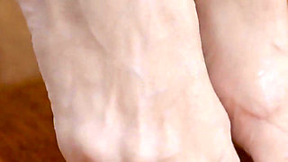 Mature Blonde MILF Soaks Her Feet in Piss