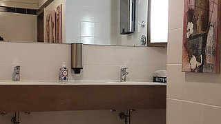 Exhibitionist in the public toilet