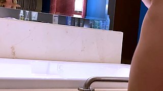 Big Boobed Blonde Masturbates With A Dildo In The Bathroom