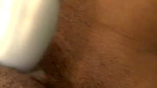 Ebony babe in solo action