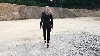 Grandma Is Walking Around a Gravel Pit in Tight Leggings and High Heels!