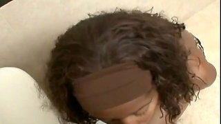 Nasty black slut enjoys a big white rod