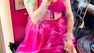 Pink To Make The Boys Wink! Tina Snua In A Leather Dress Smoking A Cigar