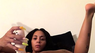 Dorothy Black and Britney use the toy