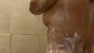 Selene takes a soapy shower and gets super hot