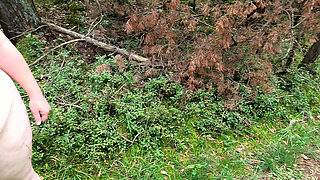 Completely Naked Through the Woods While Slapping Her Breasts