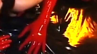 Latex masked guy and babe humiliating