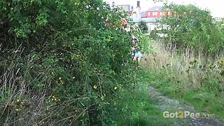 Blonde Pissing In The Field