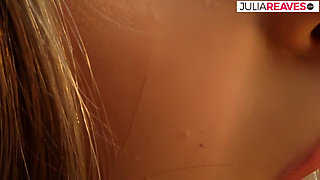 Blonde bends over as she fucks her holes with a long dildo
