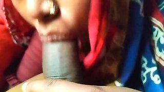 Horny Desi MILF Mom Gives Sloppy Blowjob to Young Boy in Village Bathroom