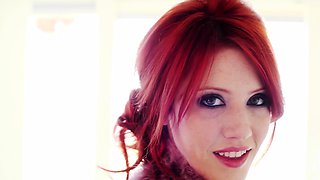 Red teen introduces her sweet pale pussy