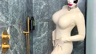 Latex Cow Undressing Under the Shower
