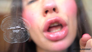 Pillow-soft Glossed Lips in a Melting Sensual Kiss