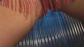 Enchanting blonde with big boobs masturbating with a sex machine