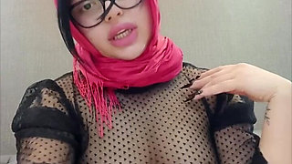 A Woman Wearing a Headscarf Passed by Herself in Her Bed