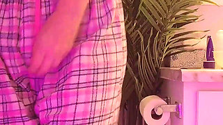 Emily pissing in the bathroom