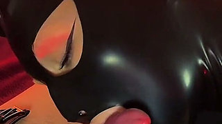 Naughty Doll Wearing a Latex Mask Gave Her Master Blowjob
