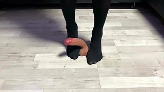 Sexy Dominatrix in Nylon Pantyhose Is Trampling Your Cock