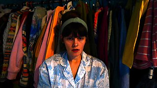 Small titted brunette Sharron with glasses masturbates