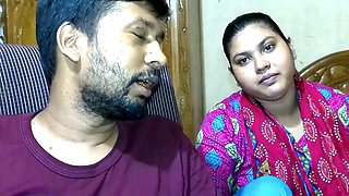 Newlywed couple and their friend getting cozy in an Indian village