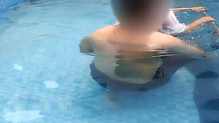 A Hot Couple's Risky Fun in the Swimming Pool.