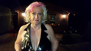 Kinky Mature Blonde Pisses Outdoors in Sexy Latex