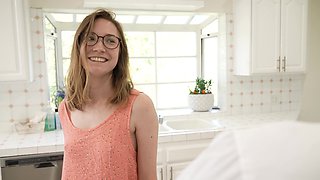 Teen Claire in glasses takes a juicy cock in the kitchen