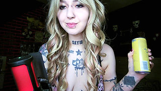 Alternative blonde drinking and burping