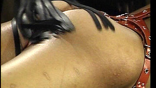 German Black Slut Got Tied up and Whipped at Bondage Show