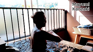 A Married Woman Taking a Bath in a Hotel Room
