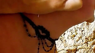 Cameraman fucks curvy mature Dickxy anal while shooting on the beach