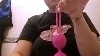 washing his Chinese balls. Sex toys for cumming