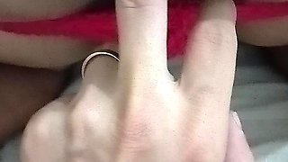 My girlfriend in a red thong is going wild with pleasure and telling me to put it all in.