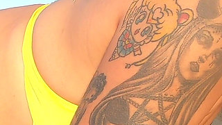 Tattooed MILF Nery Takes Hard Doggy Pounding on Beach