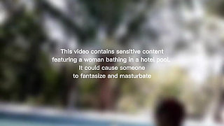 Woman Hijab Bathing Naked in an Open-air Hotel Pool