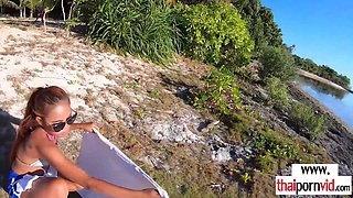 Amateur Thai teen fucking a BWC at beach