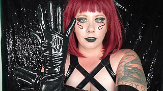 Gothic Demoness Tease in Latex Gloves and Cleavage