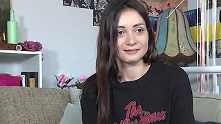 Amateur black-haired masturbates with a toy