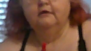Mature BBW Redhead Nurse Vicki Talks to You as She Makes a Lipstick Applying Video for You!