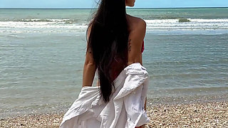 Pink Bikini and Hot Beauty Pleasure on the Beach